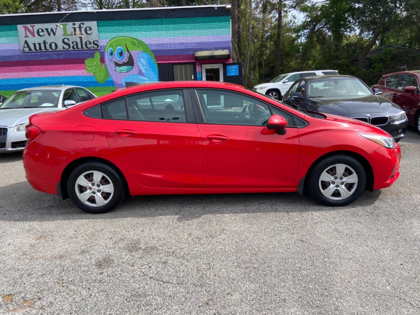 2016 RED CHEVROLET CRUZE LS AUTO (1G1BC5SM7G7) with an 1.4L engine, Automatic transmission, located at 5103 Dorchester Rd., Charleston, SC, 29418-5607, (843) 767-1122, 36.245171, -115.228050 - Photo#7